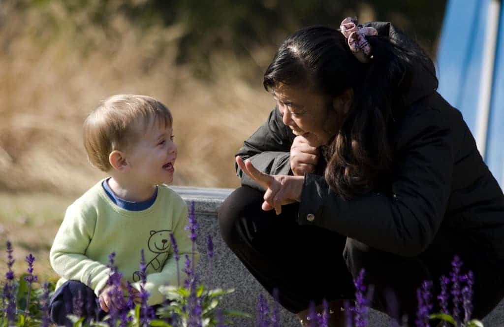 Toddler interacting with a woman in China