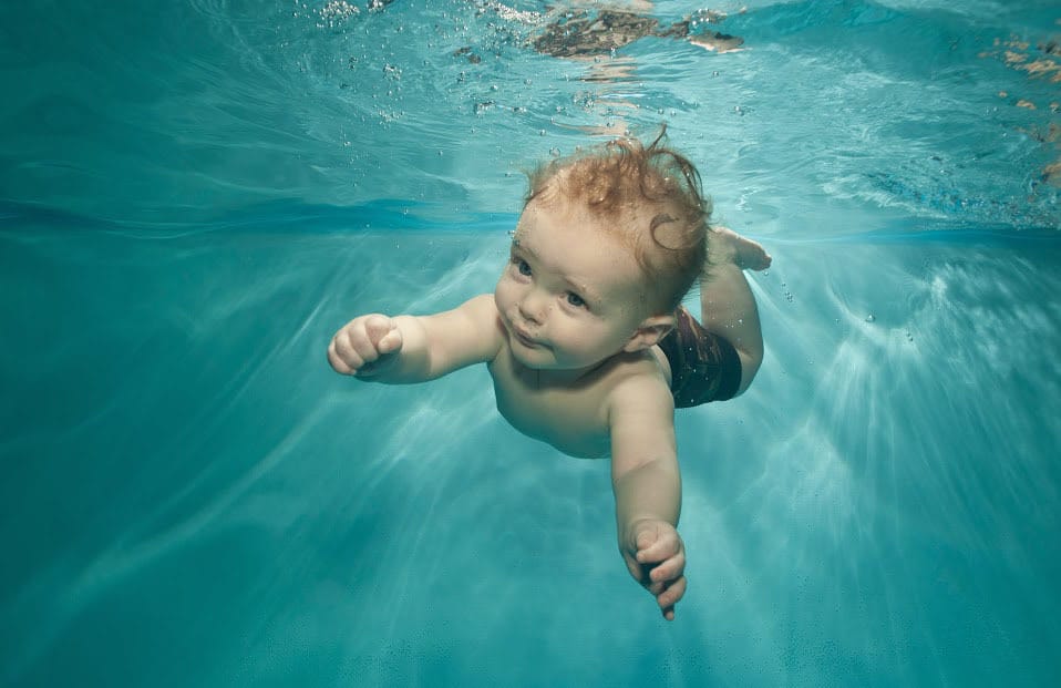 Baby swimming underwater