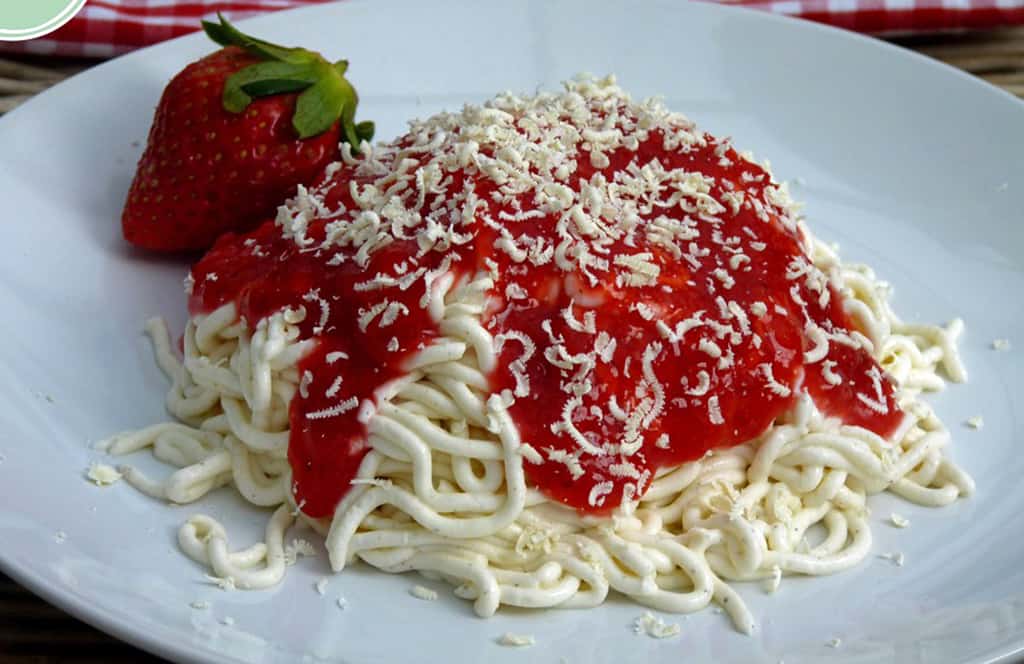 Ice cream shaped like spaghetti noddles with sauce