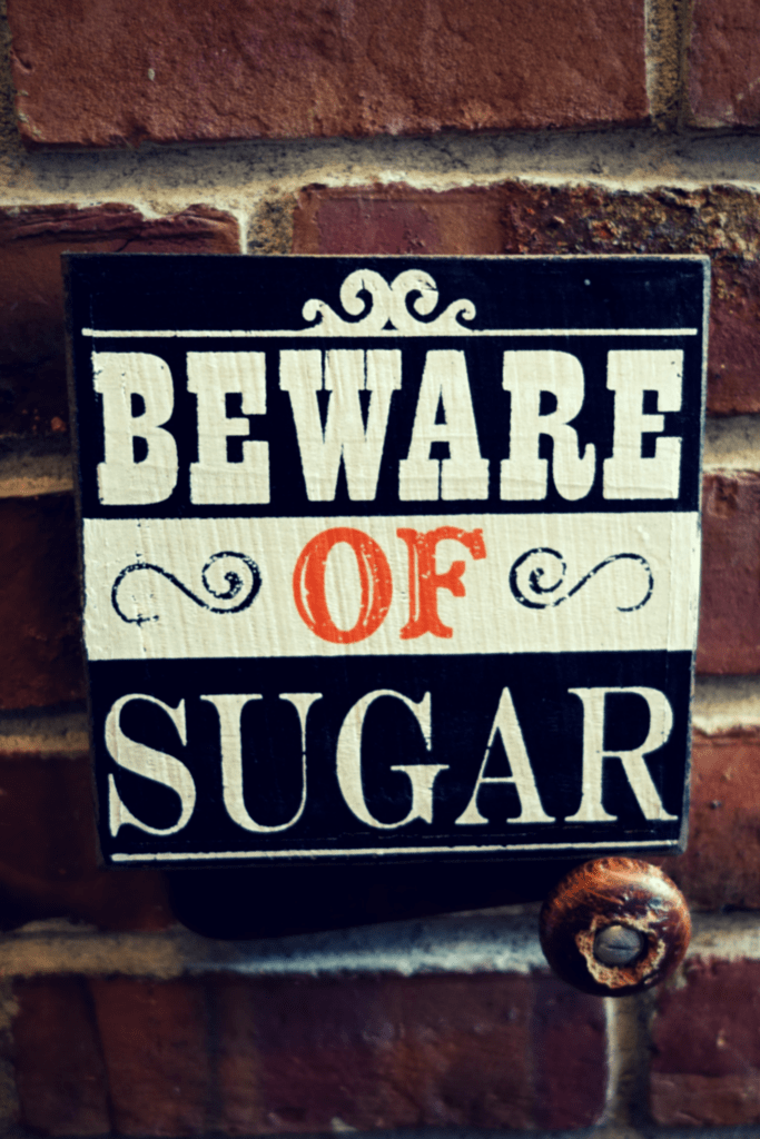 Rustic Wooden Halloween Sign that Reads "Beware of Sugar"