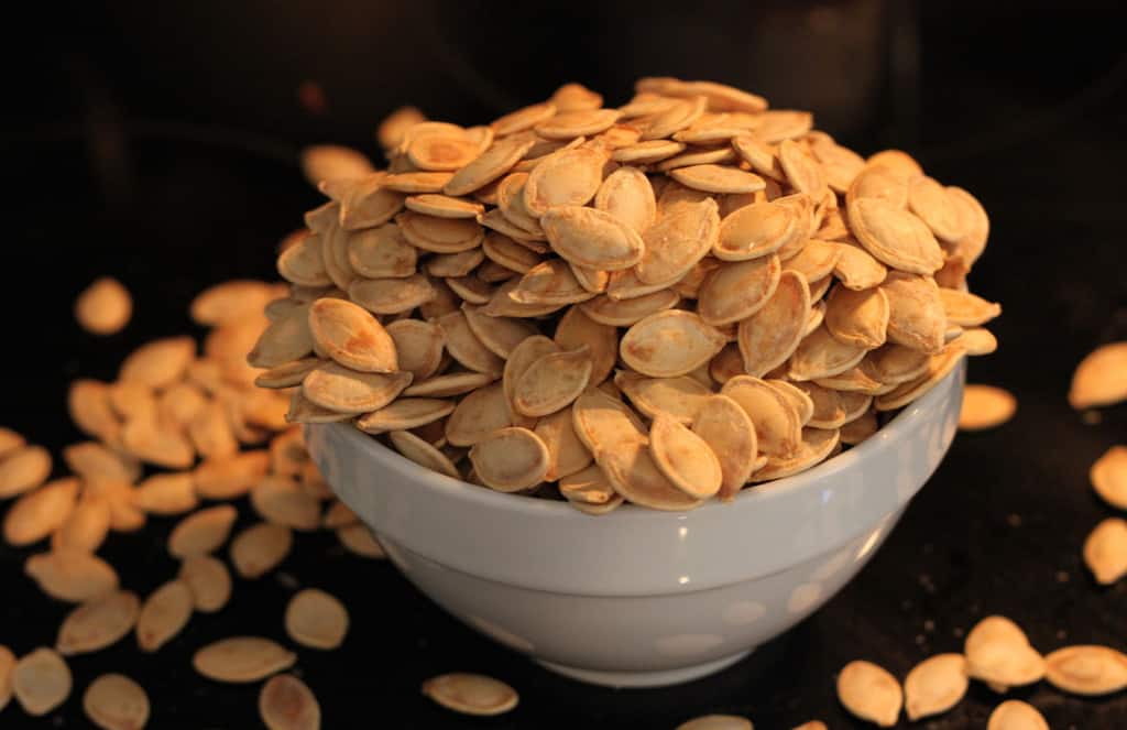Bowl of homemade roasted pumpkin seeds